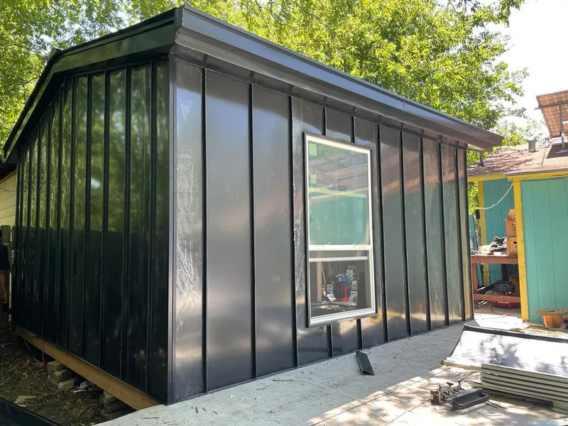 Black standing seam metal wall panels for Metal Roof Installation in Westlake